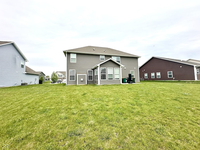 9133 Thames Dr, Avon, IN 46123 - rear view of property with a yard and central AC unit