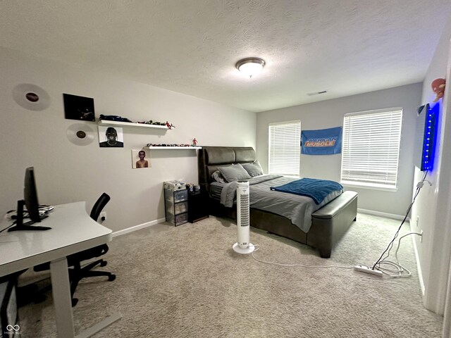 9133 Thames Dr, Avon, IN 46123 - carpeted bedroom with a textured ceiling, baseboards, and a desk