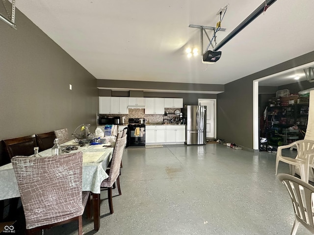 9133 Thames Dr, Avon, IN 46123 - dining area with dark aggregate flooring