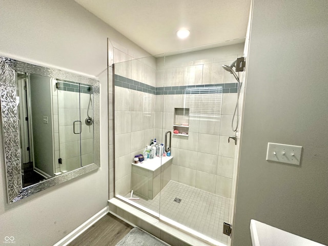 9133 Thames Dr, Avon, IN 46123 - full bath featuring a shower stall, wood finished floors, and baseboards