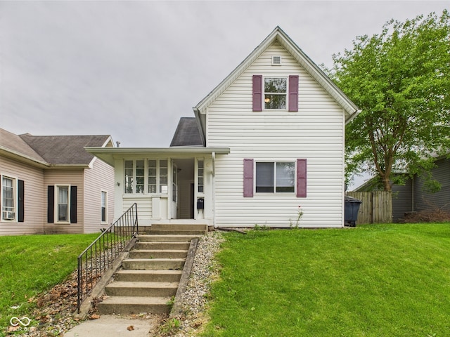 907 S A St, Elwood, IN 46036 - traditional-style house featuring a front lawn