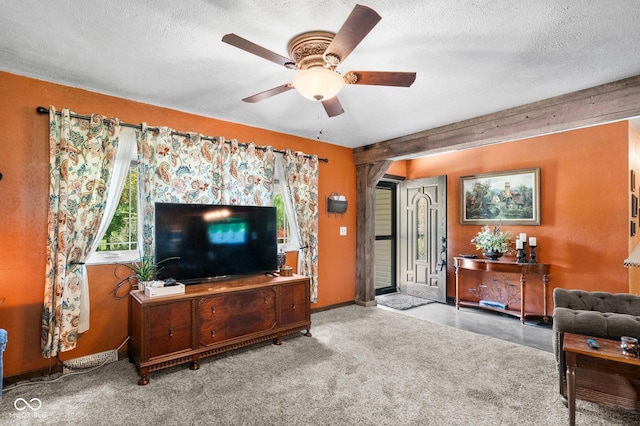3480 W Broadus Dr, North Vernon, IN 47265 - living area with ceiling fan, a textured ceiling, and baseboards