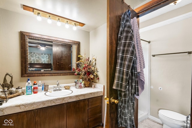 3480 W Broadus Dr, North Vernon, IN 47265 - full bathroom featuring vanity, toilet, and a shower stall