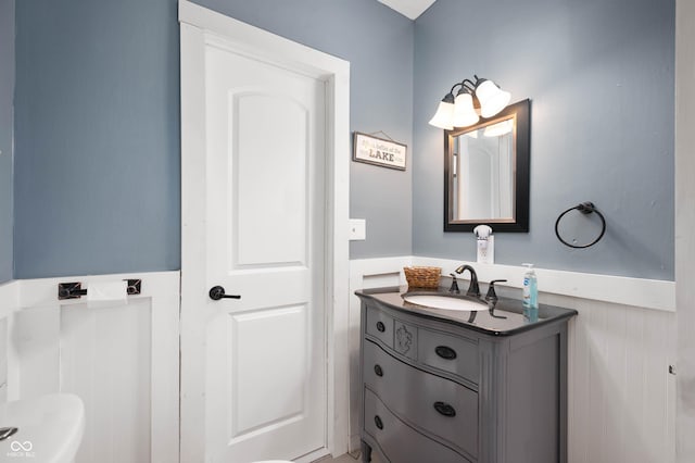 3360 Main St, Plainfield, IN 46168 - bathroom featuring a wainscoted wall and vanity