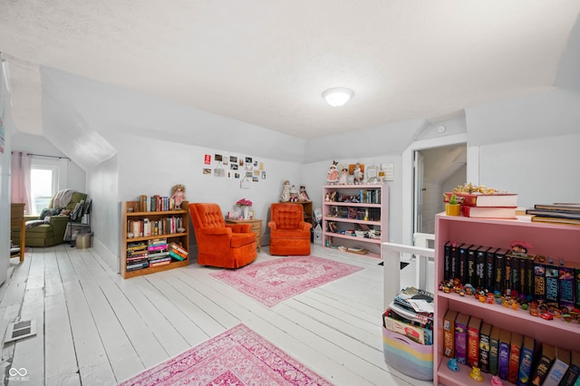 3360 Main St, Plainfield, IN 46168 - playroom with hardwood / wood-style floors and lofted ceiling