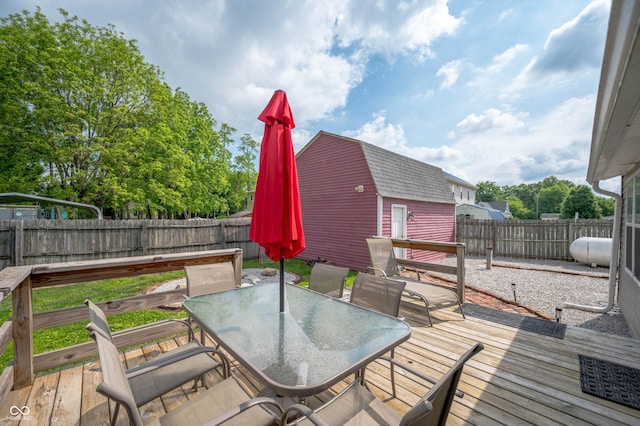 3360 Main St, Plainfield, IN 46168 - deck featuring outdoor dining space and a fenced backyard