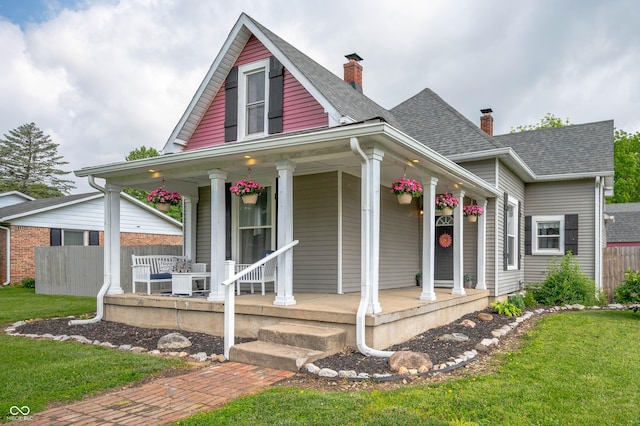 3360 Main St, Plainfield, IN 46168 - bungalow-style house with a porch, a chimney, and a shingled roof