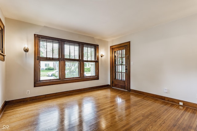 595 W Poplar St, Zionsville, IN 46077 - unfurnished room featuring wood finished floors and baseboards