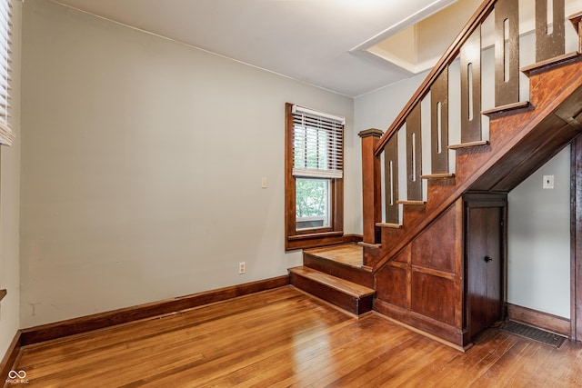 595 W Poplar St, Zionsville, IN 46077 - stairway featuring hardwood / wood-style flooring and baseboards