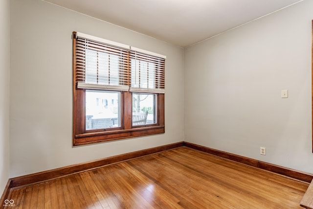 595 W Poplar St, Zionsville, IN 46077 - spare room featuring baseboards and wood-type flooring