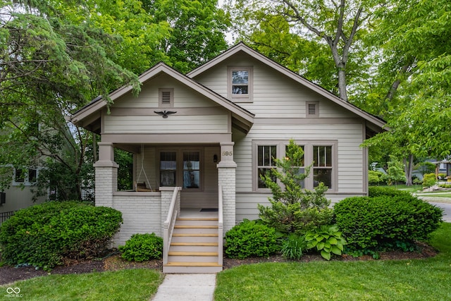 595 W Poplar St, Zionsville, IN 46077 - bungalow-style home with a porch, stairs, and a front yard