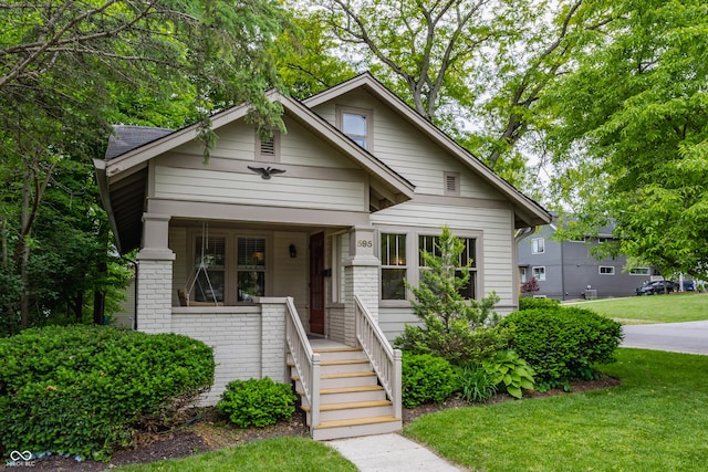 595 W Poplar St, Zionsville, IN 46077 - bungalow-style home featuring a front yard and covered porch