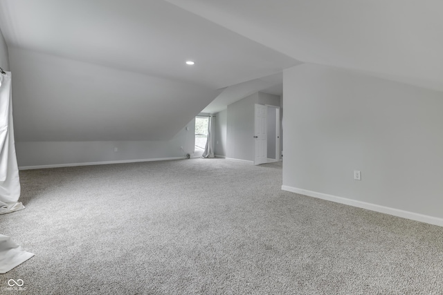 9317 E 36th Pl, Indianapolis, IN 46235 - bonus room featuring carpet floors, vaulted ceiling, baseboards, and recessed lighting