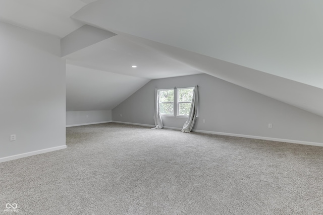 9317 E 36th Pl, Indianapolis, IN 46235 - additional living space featuring vaulted ceiling, carpet flooring, baseboards, and recessed lighting