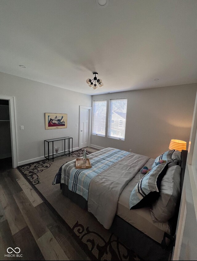 811 E Minnesota St, Indianapolis, IN 46203 - bedroom with wood finished floors and baseboards