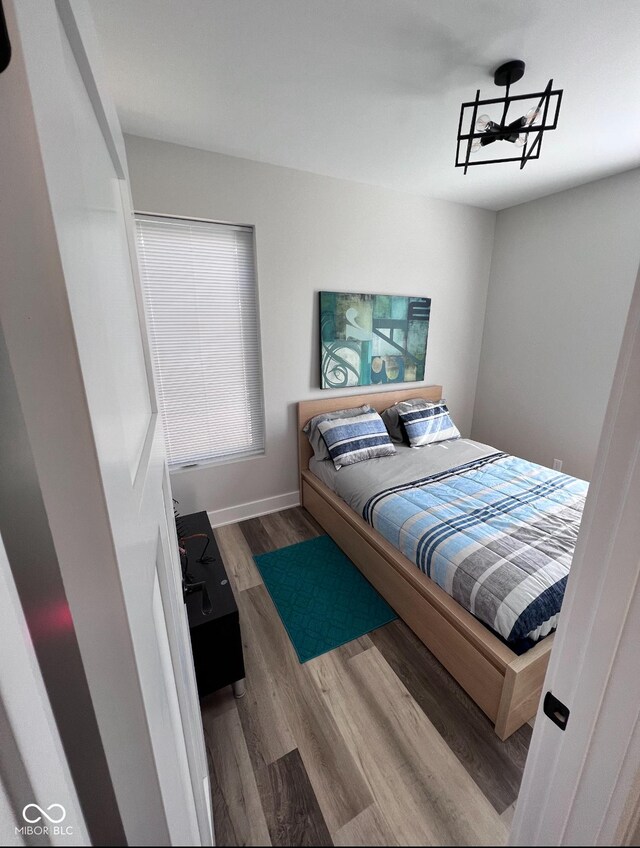 811 E Minnesota St, Indianapolis, IN 46203 - bedroom with wood finished floors and baseboards
