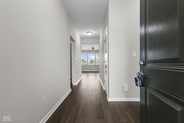 11815 Adair Pl, Indianapolis, IN 46229 - hallway with dark wood-style floors and baseboards