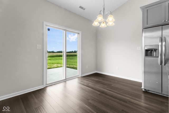 11815 Adair Pl, Indianapolis, IN 46229 - unfurnished dining area with a chandelier, baseboards, dark wood-style flooring, and vaulted ceiling