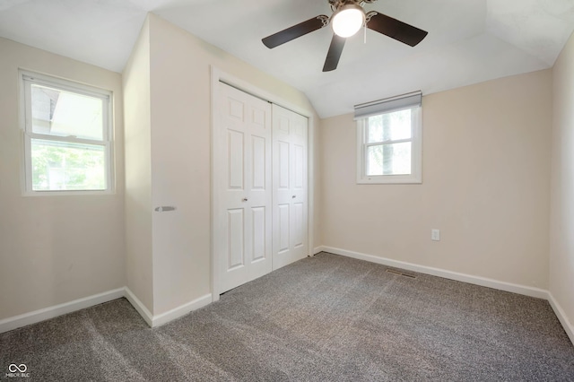 2618 High St, New Castle, IN 47362 - unfurnished bedroom featuring carpet, vaulted ceiling, a closet, and baseboards