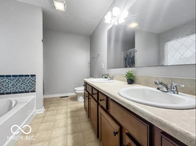 4689 Muscatine Way, Westfield, IN 46062 - bathroom with double vanity, a bath, toilet, baseboards, and tile patterned flooring