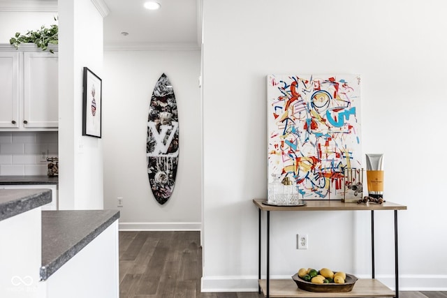 435 Virginia Ave Unit 106, Indianapolis, IN 46203 - detailed view of ornamental molding, wood finished floors, tasteful backsplash, recessed lighting, and baseboards