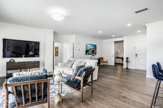 435 Virginia Ave Unit 106, Indianapolis, IN 46203 - living area with crown molding, recessed lighting, wood finished floors, and baseboards