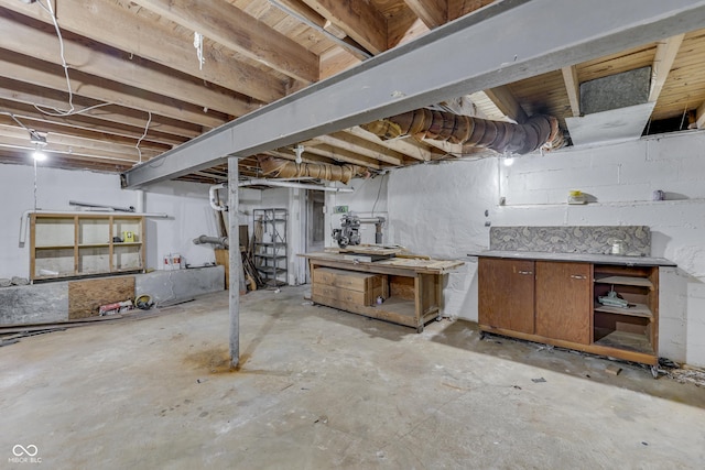 1601 Southern Ave, Beech Grove, IN 46107 - unfinished basement featuring a workshop area