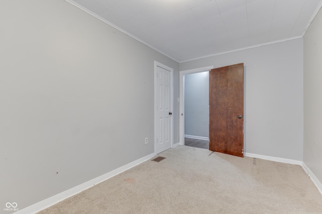 1601 Southern Ave, Beech Grove, IN 46107 - carpeted spare room featuring crown molding and baseboards