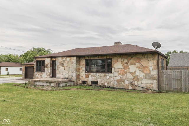 1601 Southern Ave, Beech Grove, IN 46107 - view of front of home featuring stone siding, an attached garage, driveway, and roof with shingles