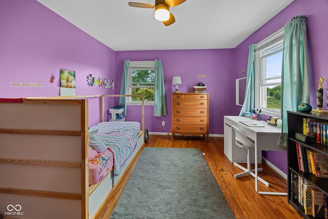 124 Knox Dr, West Lafayette, IN 47906 - bedroom with wood finished floors, ceiling fan, and baseboards
