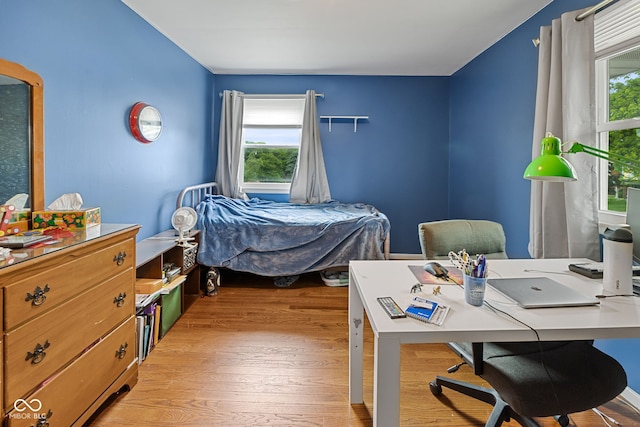 124 Knox Dr, West Lafayette, IN 47906 - bedroom with light wood-type flooring and an office area