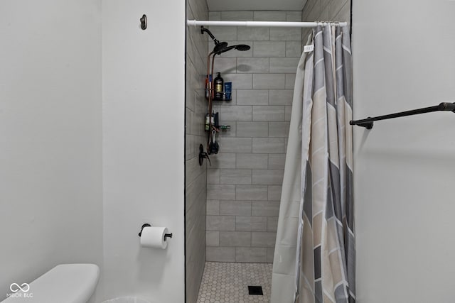 124 Knox Dr, West Lafayette, IN 47906 - bathroom featuring toilet and a tile shower