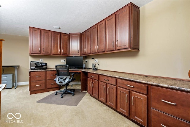 14711 Macduff Dr, Noblesville, IN 46062 - office space with built in study area, light colored carpet, and a textured ceiling
