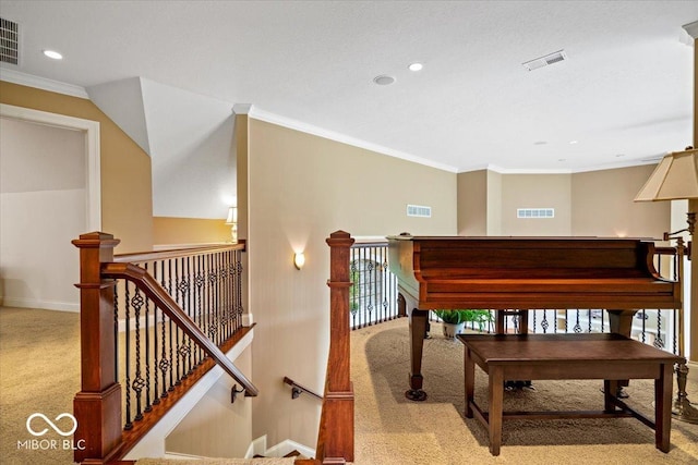14711 Macduff Dr, Noblesville, IN 46062 - living area featuring carpet flooring, an upstairs landing, baseboards, crown molding, and recessed lighting