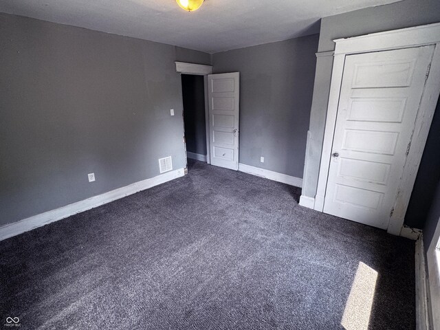 3502 N Kenwood Ave, Indianapolis, IN 46208 - unfurnished bedroom featuring carpet and baseboards