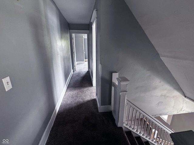 3502 N Kenwood Ave, Indianapolis, IN 46208 - hallway featuring carpet floors, baseboards, and an upstairs landing
