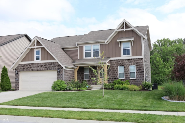 9903 Deep Royal Way, Indianapolis, IN 46239 - craftsman inspired home featuring board and batten siding, brick siding, concrete driveway, a front lawn, and roof with shingles