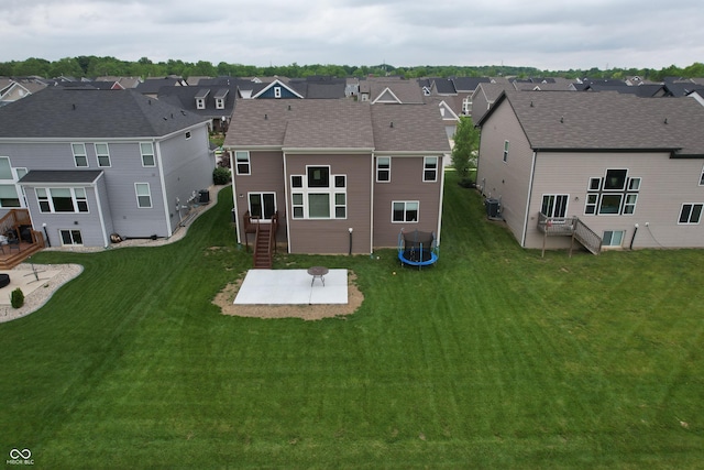 9903 Deep Royal Way, Indianapolis, IN 46239 - rear view of property featuring a patio, a residential view, central AC unit, and a yard