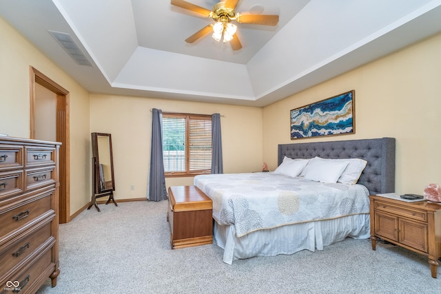 4399 Summerhaven Dr, New Palestine, IN 46163 - bedroom featuring a raised ceiling, light carpet, a ceiling fan, and baseboards