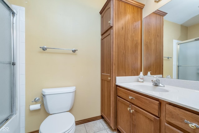 4399 Summerhaven Dr, New Palestine, IN 46163 - bathroom with a shower with shower door, vanity, toilet, tile patterned floors, and baseboards