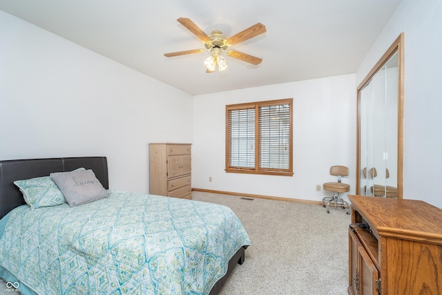 4399 Summerhaven Dr, New Palestine, IN 46163 - bedroom featuring carpet floors, baseboards, and ceiling fan