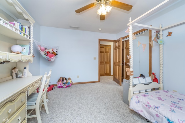 4399 Summerhaven Dr, New Palestine, IN 46163 - bedroom featuring light carpet, an office area, ceiling fan, and baseboards