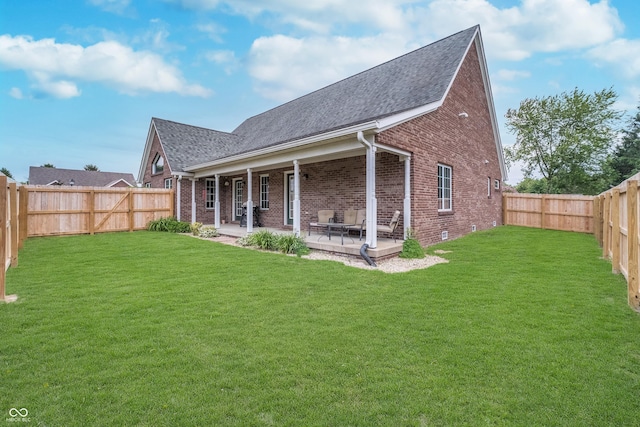 4399 Summerhaven Dr, New Palestine, IN 46163 - back of property featuring brick siding, a shingled roof, and a patio