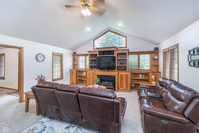 4399 Summerhaven Dr, New Palestine, IN 46163 - living room with light carpet, a ceiling fan, lofted ceiling, and a fireplace