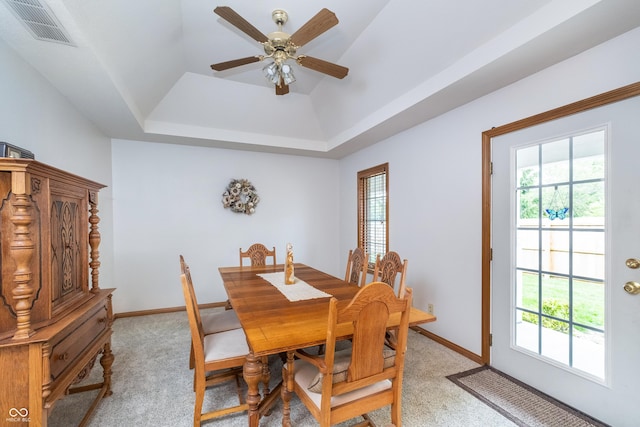 4399 Summerhaven Dr, New Palestine, IN 46163 - dining room featuring light colored carpet, plenty of natural light, and a raised ceiling