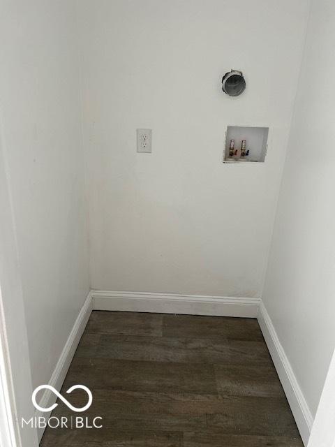 2936 Guilford Ave, Indianapolis, IN 46205 - washroom featuring hookup for a washing machine, wood finished floors, and baseboards