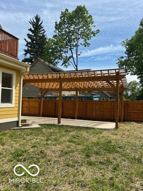 2936 Guilford Ave, Indianapolis, IN 46205 - view of yard featuring a pergola and a patio
