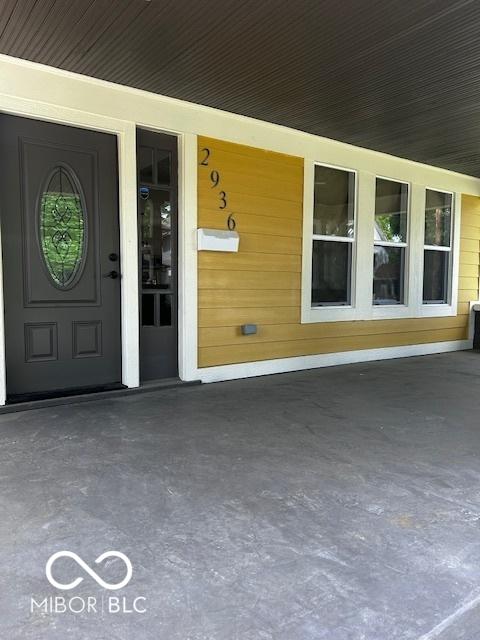 2936 Guilford Ave, Indianapolis, IN 46205 - doorway to property featuring a porch