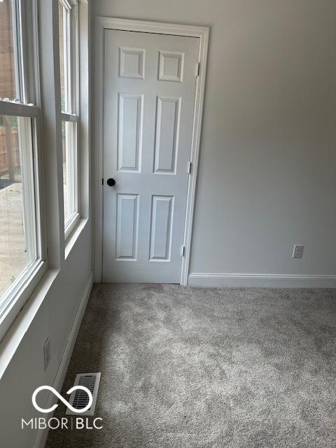 2936 Guilford Ave, Indianapolis, IN 46205 - unfurnished room with carpet floors and baseboards