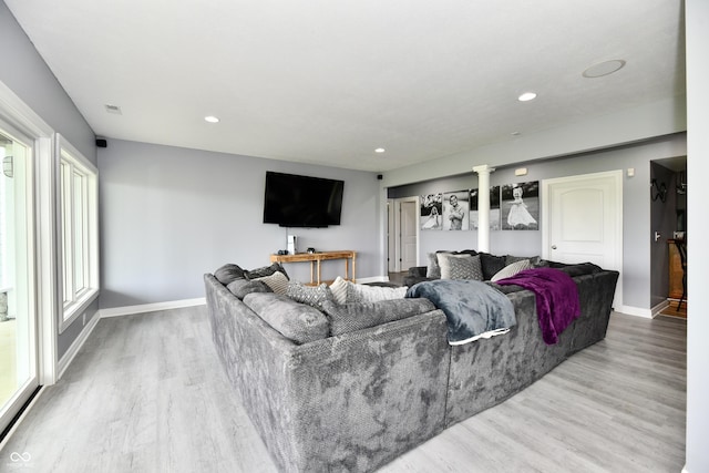 5758 N 900 W, Thorntown, IN 46071 - living room with wood finished floors, baseboards, and recessed lighting